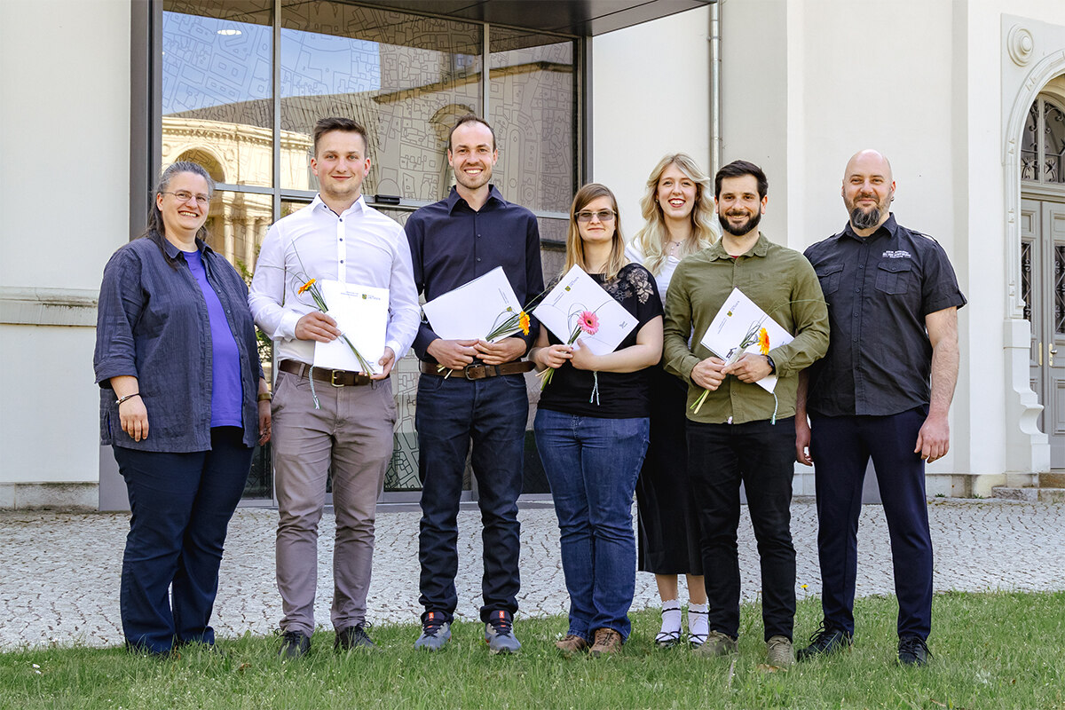 Foto vom Team Laufbahnausbildung mit den vier Vermessungsoberinspektoren