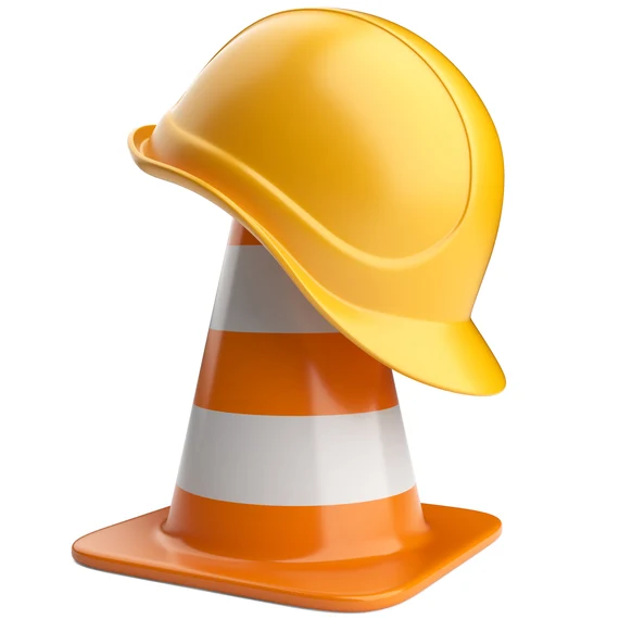 Baustellenkegel und Bauhelm